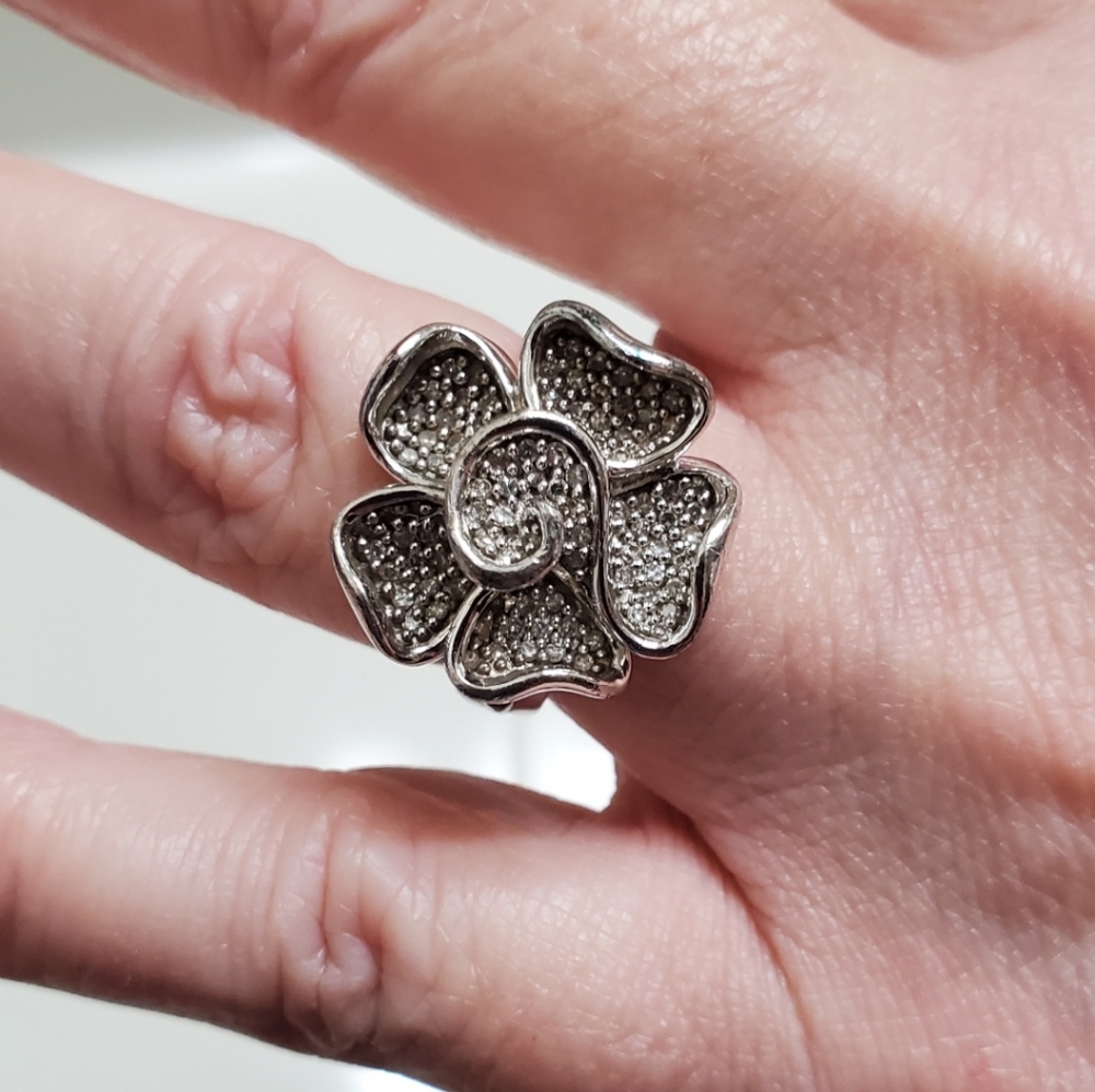 Sterling silver flower ring with .5 carat real dia